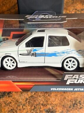 Volkswagen Jetta Die-Cast Toy Car - White with Blue Graphics